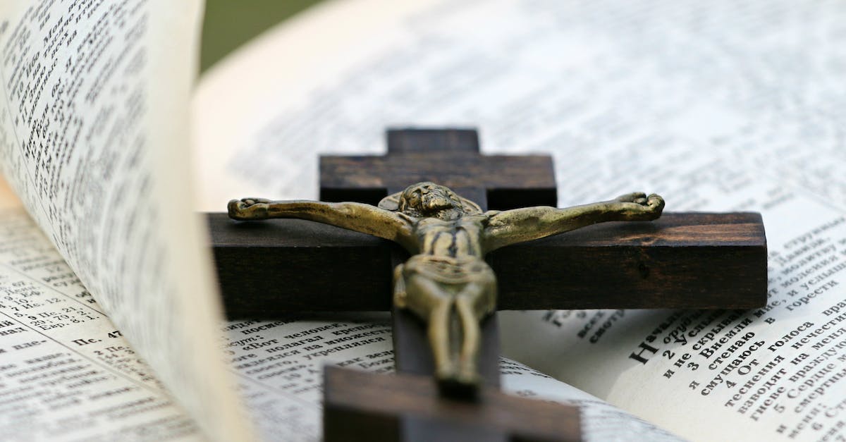 I can't become a vampire lord - Crucifix on Top of Bible