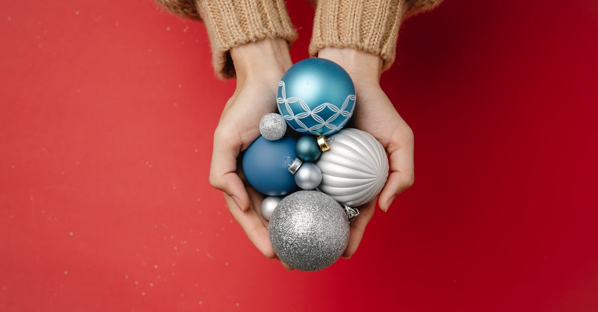 I can't craft a Silver Watch? Terarria - Top view of unrecognizable female in warm knitted clothes holding Christmas tree hanging baubles on red background I can't craft a Silver Watch? Terarria - Top view of unrecognizable female in warm knitted clothes holding Christmas tree hanging baubles on red background
