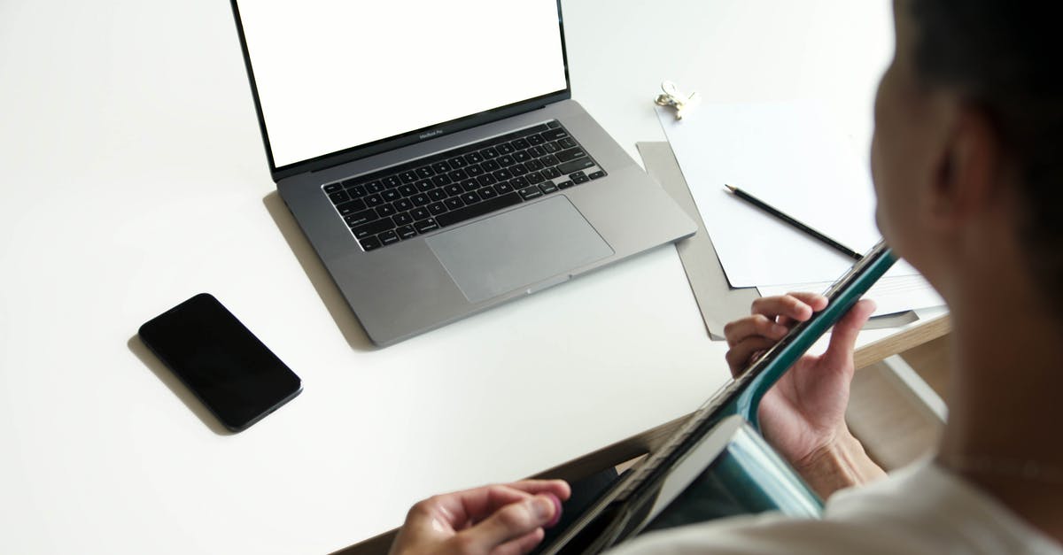 I don't have access to the gallery in The Sims 4 - Macbook Pro on White Table I don't have access to the gallery in The Sims 4 - Macbook Pro on White Table
