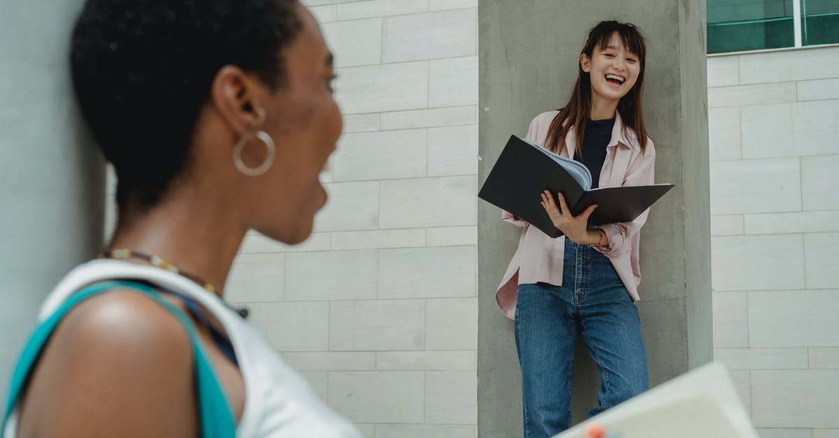 I have 2 pets, do they interact with each other? - Cheerful multiethnic students having fun