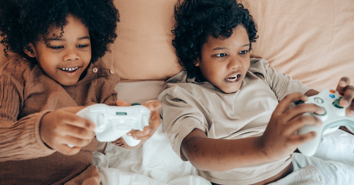 I have Xbox One can I play with my friend on Xbox 360 on Black Ops 2 - Happy ethnic siblings playing with gamepad at home I have Xbox One can I play with my friend on Xbox 360 on Black Ops 2 - Happy ethnic siblings playing with gamepad at home