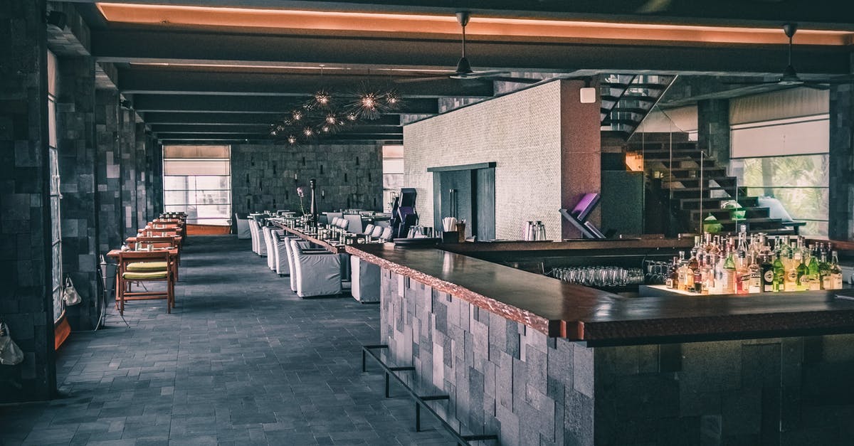 I killed a hostile mercenary in the Bar area and now everybody is hostile there! - Modern interior of restaurant in dark tones