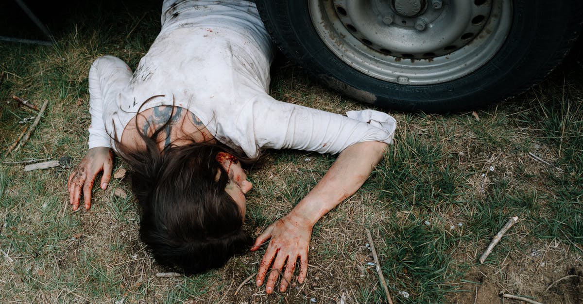 I killed a krampus - Dead Woman lying underneath a Car 