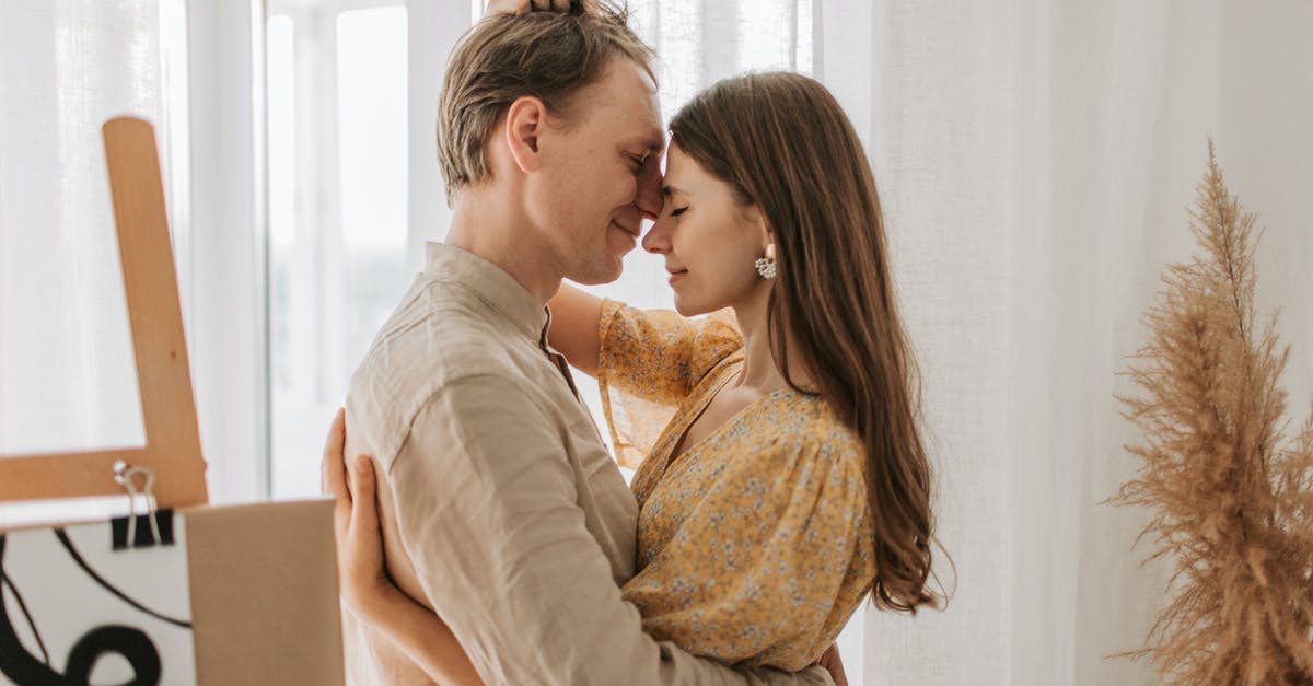 I lost my husband [closed] - Woman in Beige Long Sleeve Shirt Sitting on Brown Sofa