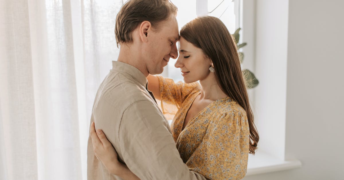 I lost my husband [closed] - Man and Woman Kissing Near Window