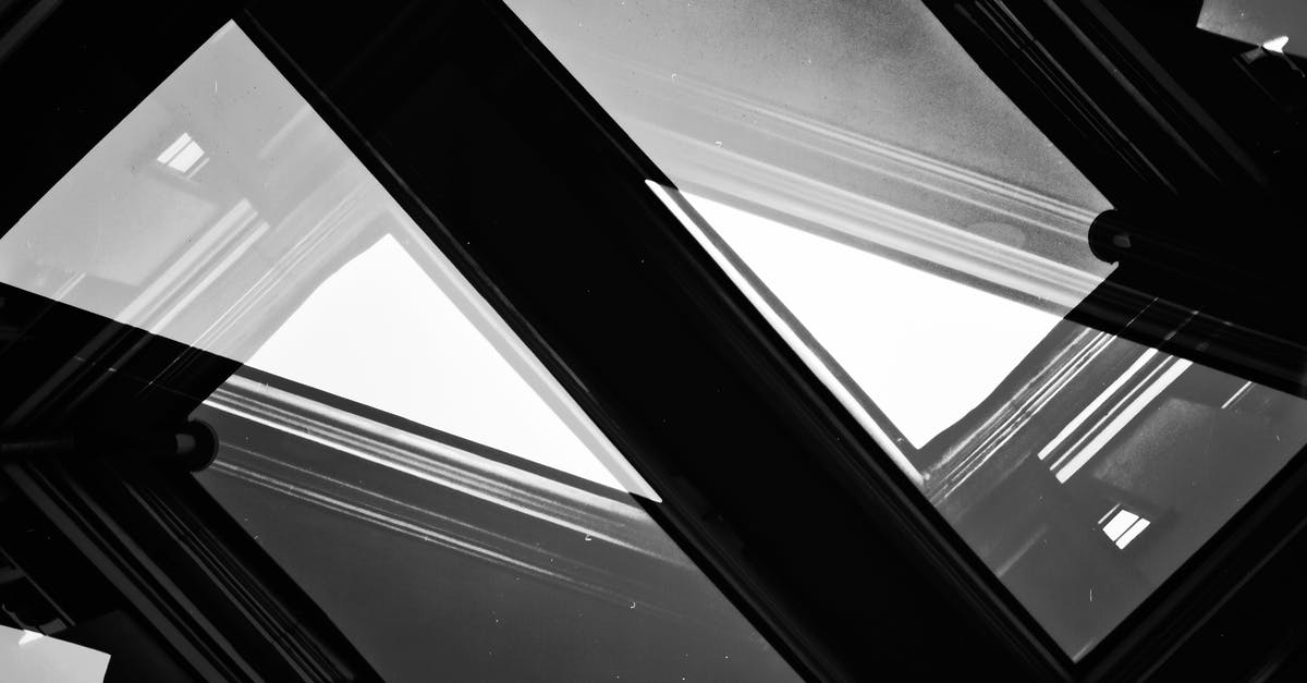 I want to make multiple blocks be placed in a /fill command in Minecraft - From below black and white of abstract residential houses and clear sky in city