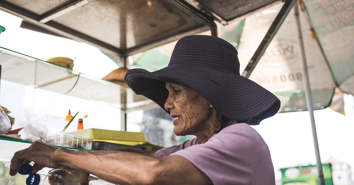 I want to sell a non-marketable hat in TF2. Is there any way to go about it? [closed] - Woman in Pink Short-sleeved Shirt