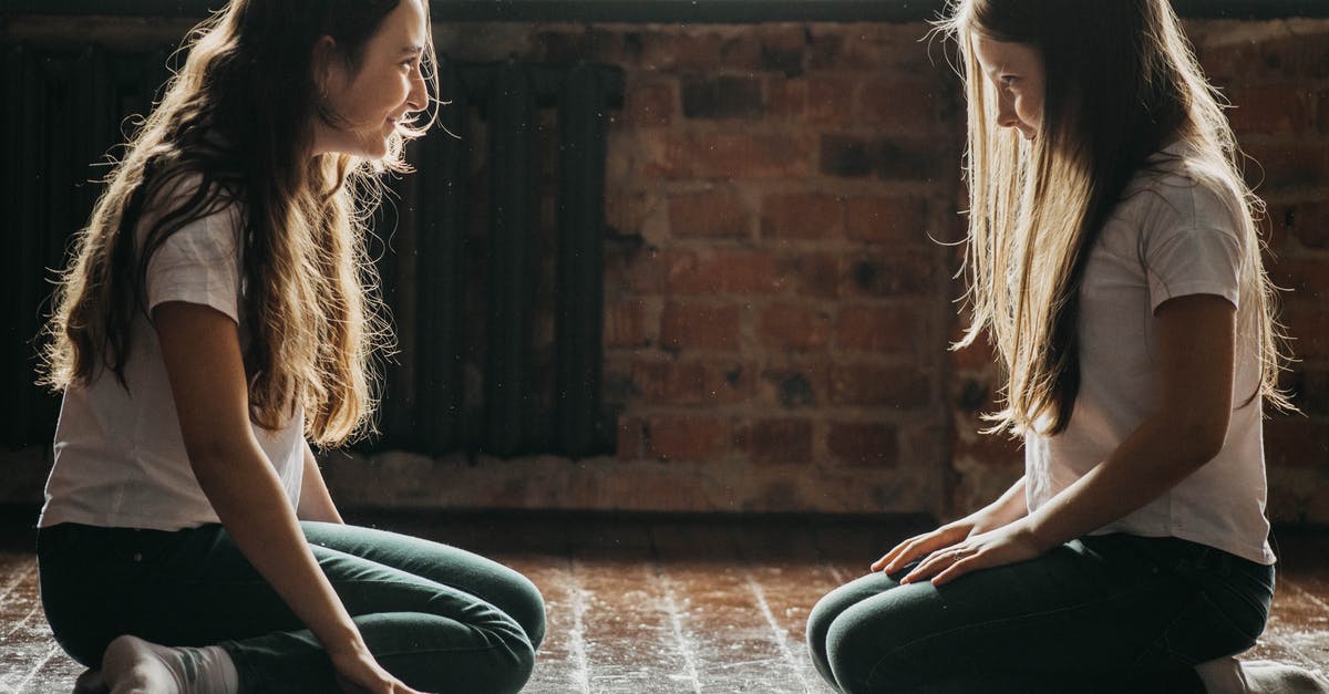 If I breed two Ditto with each other, will I get a random Pokemon? - Two Teenage Girls Kneeling on Floor Smiling and Looking at Each Other