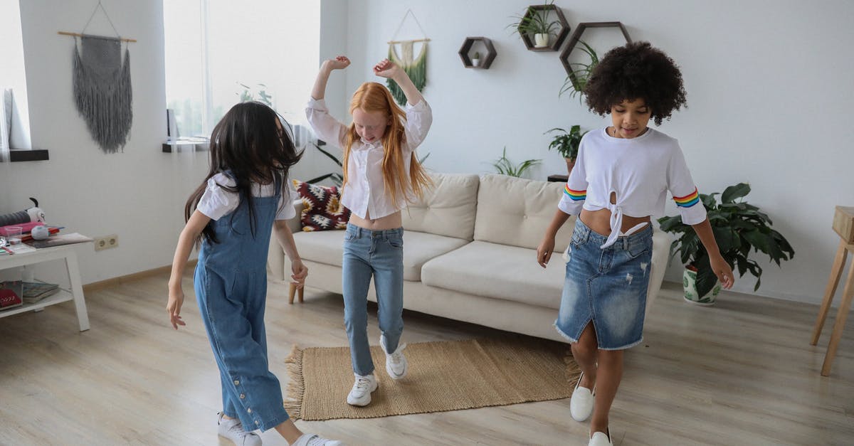 If I have a shiny Nincada, what happens? - Cheerful multiethnic girlfriends near unrecognizable friend in casual denim apparel having fun in living room If I have a shiny Nincada, what happens? - Cheerful multiethnic girlfriends near unrecognizable friend in casual denim apparel having fun in living room