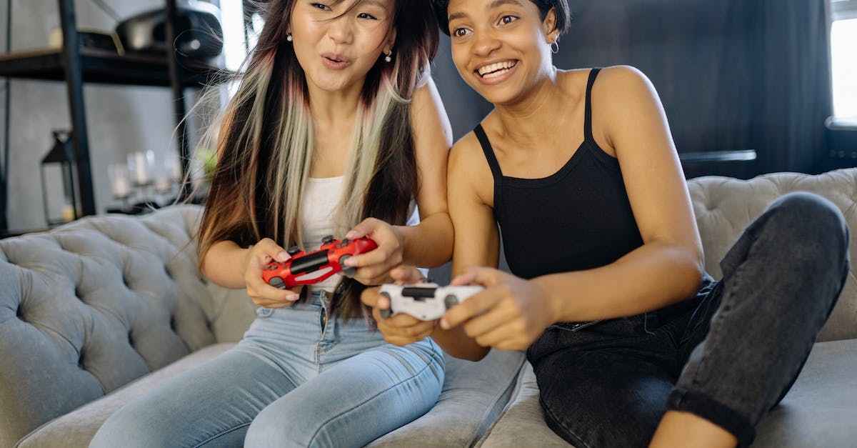 If i have changed the configs file in Iguana Tinker Tweaks can my friends still join my lan game? - Women Having Fun Playing Video Game