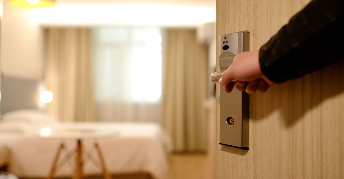 If I have guests at my entrance and in my queue, which are chosen first? - Person Holding on Door Lever Inside Room If I have guests at my entrance and in my queue, which are chosen first? - Person Holding on Door Lever Inside Room