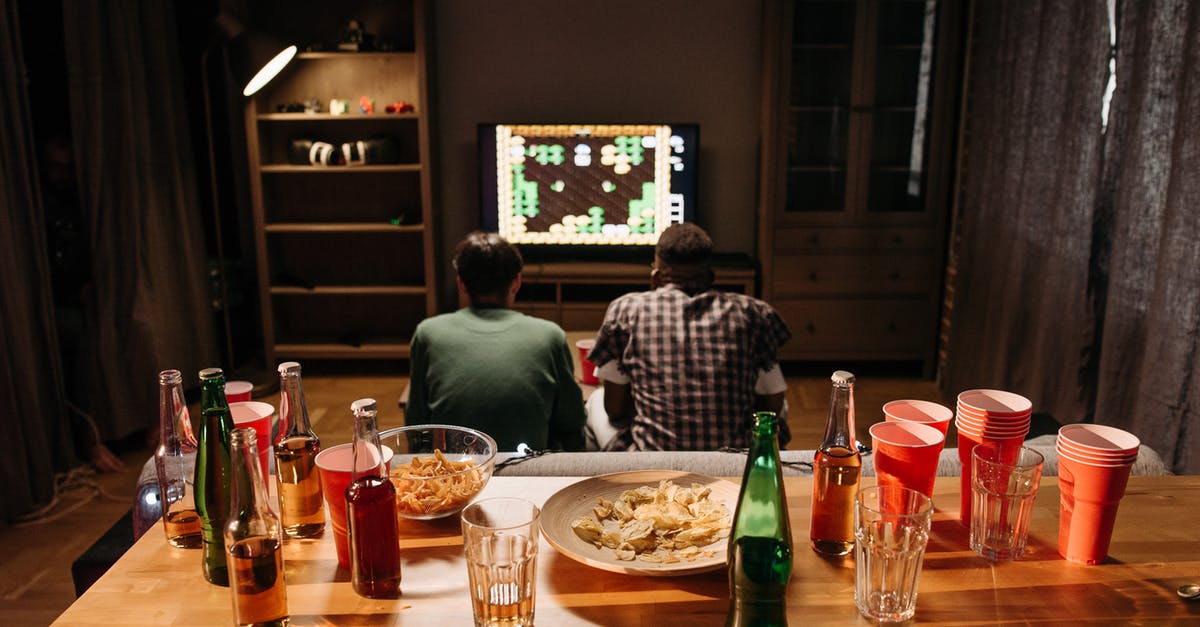 If I just purchased a game, but canceled the download, how do I get it back? - Two Men Playing Video Game If I just purchased a game, but canceled the download, how do I get it back? - Two Men Playing Video Game