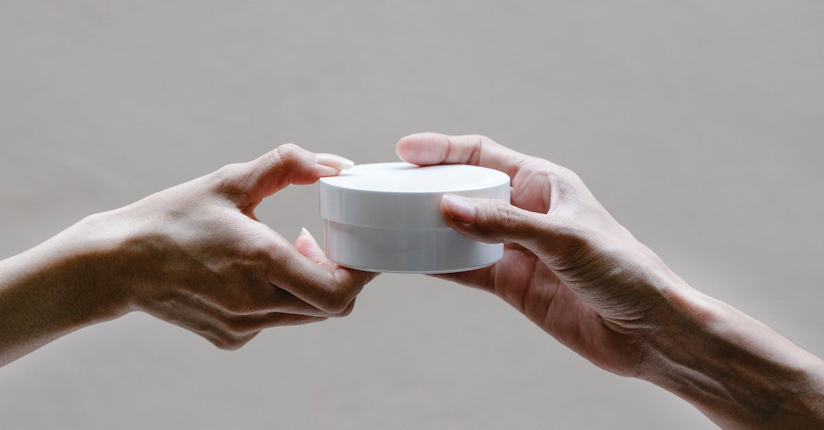 If I receive a hacked Pokemon over Wondertrade will it corrupt the game? [duplicate] - Crop woman passing jar of cream to girlfriend