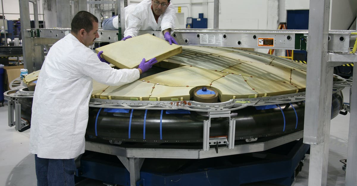 If I sell a component is it available to others on the same station? - Professional mechanics installing spaceship detail at factory