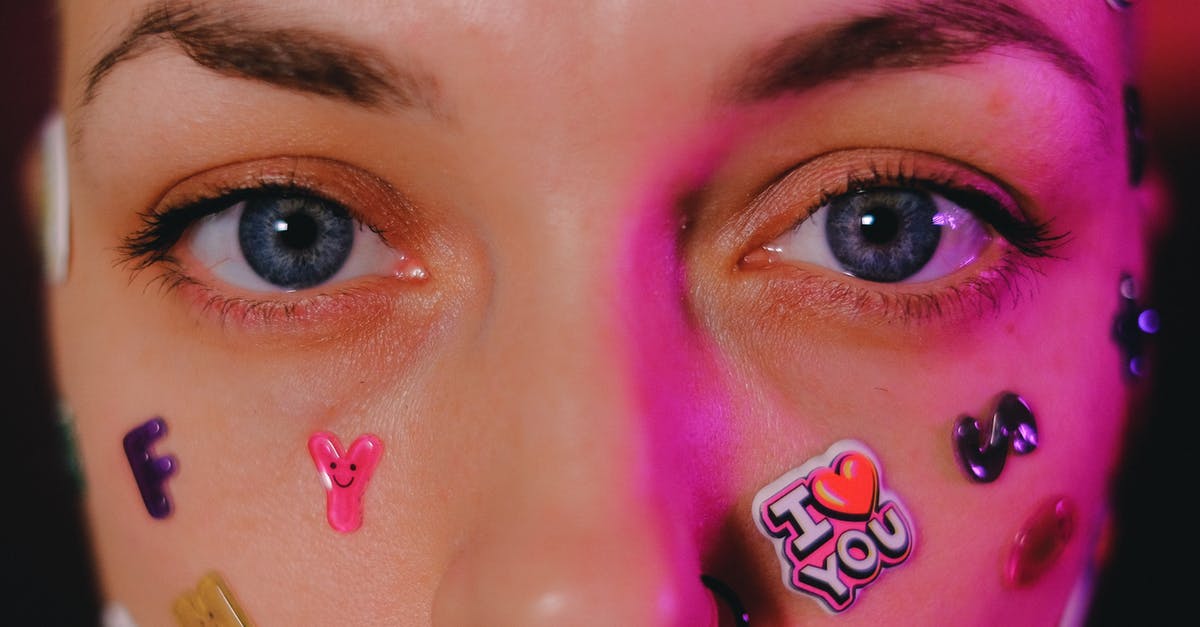 If I use the "Clicker" item can I get achievments for the original character? - Crop calm female with nose piercing and letter stickers on face standing on dark background and looking at camera If I use the "Clicker" item can I get achievments for the original character? - Crop calm female with nose piercing and letter stickers on face standing on dark background and looking at camera