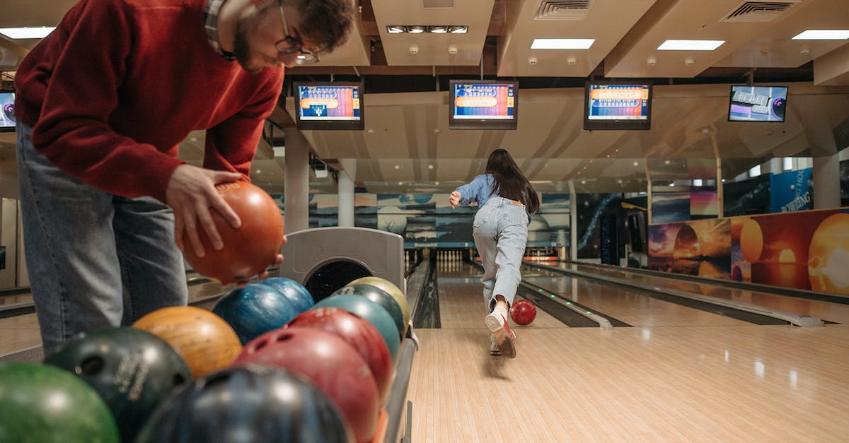 If no champions play, does the game last forever? - Man in Red Long Sleeve Shirt and Gray Pants Playing Bowling