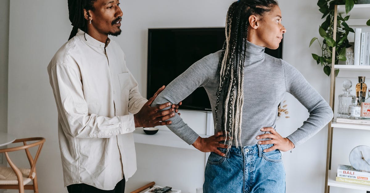 Ignored testfor parameters - African American stylish man apologizing to sad girlfriend while having conflict at home Ignored testfor parameters - African American stylish man apologizing to sad girlfriend while having conflict at home