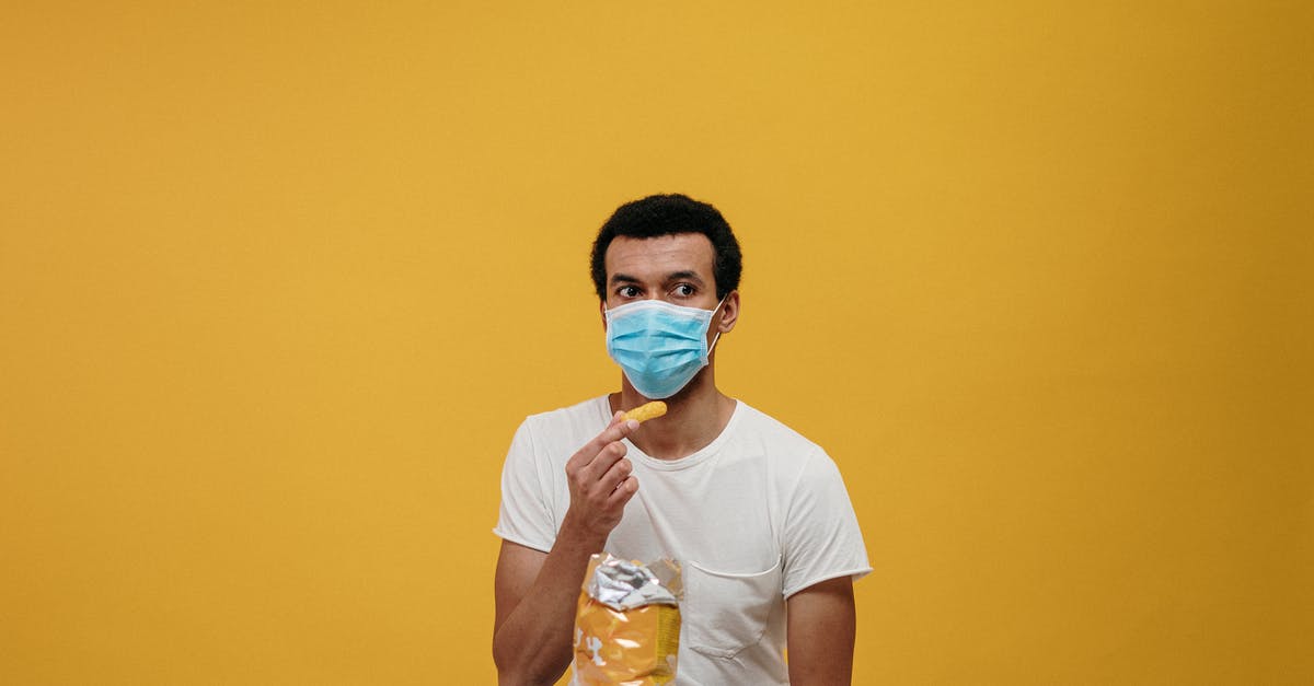 In agar.io, how much overlap is needed to eat another player or virus? - Man in White Crew Neck T-shirt Eating Chips In agar.io, how much overlap is needed to eat another player or virus? - Man in White Crew Neck T-shirt Eating Chips