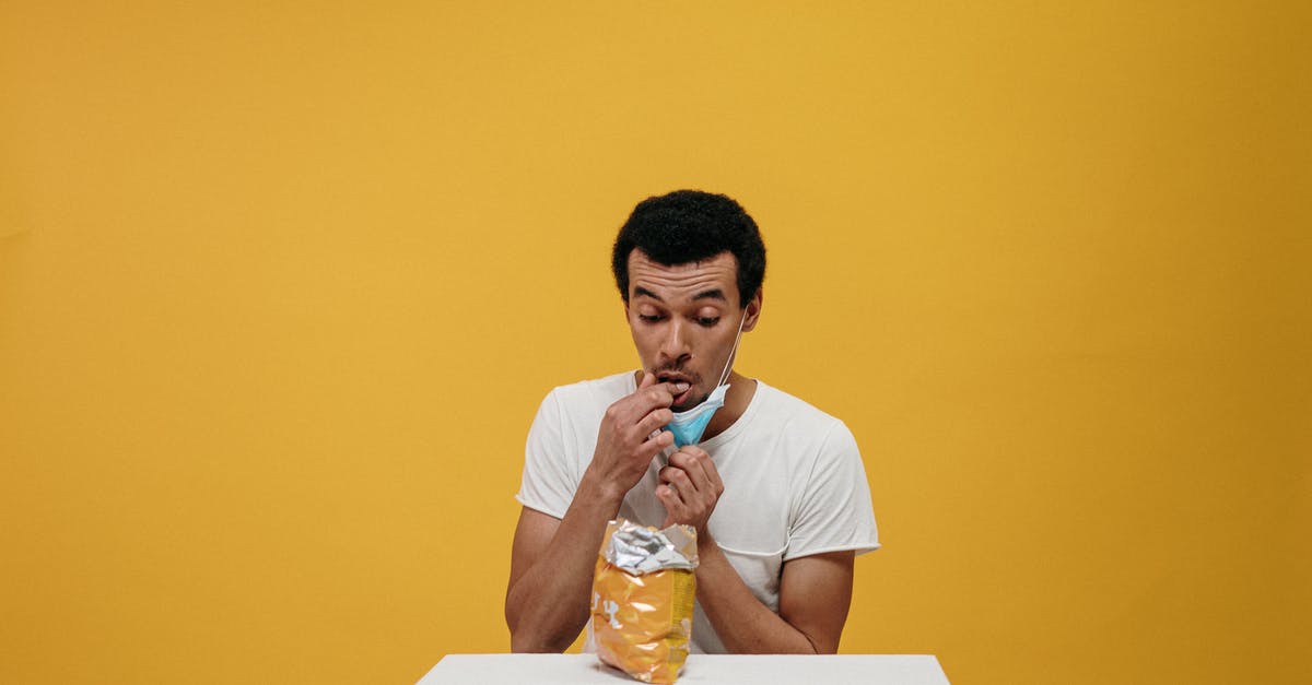 In agar.io, how much overlap is needed to eat another player or virus? - Man in White Crew Neck T-shirt Eating Chips In agar.io, how much overlap is needed to eat another player or virus? - Man in White Crew Neck T-shirt Eating Chips