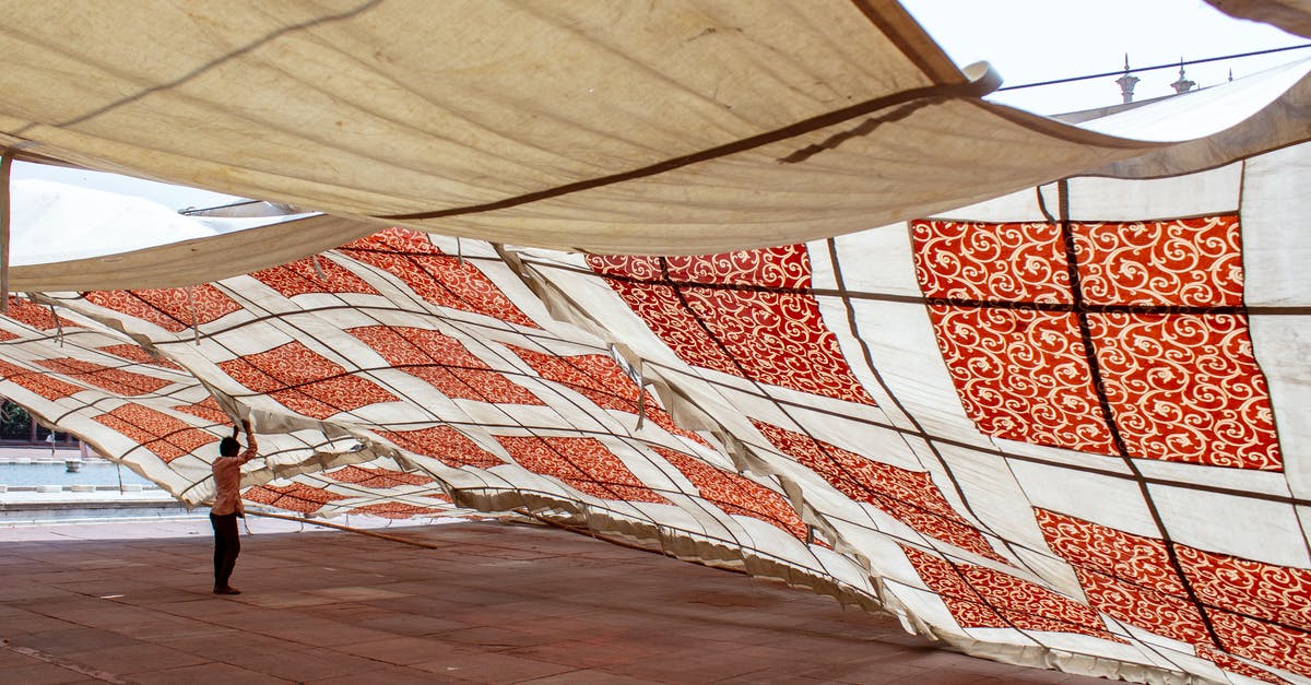 In Atomas, what determines the next element a player receives? - Woman in Black Jacket Sitting on White and Red Textile