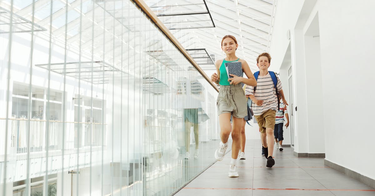 In Caesar 3, how many tiles do school children run? - Children Running on a Tiled Corridor