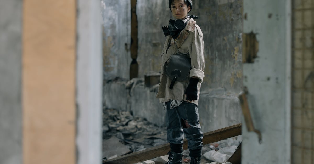 In Chrono Trigger, I'm stuck in the future ruins with the seed - Man in Gray Jacket and Blue Denim Jeans Standing on Gray Concrete Stairs In Chrono Trigger, I'm stuck in the future ruins with the seed - Man in Gray Jacket and Blue Denim Jeans Standing on Gray Concrete Stairs