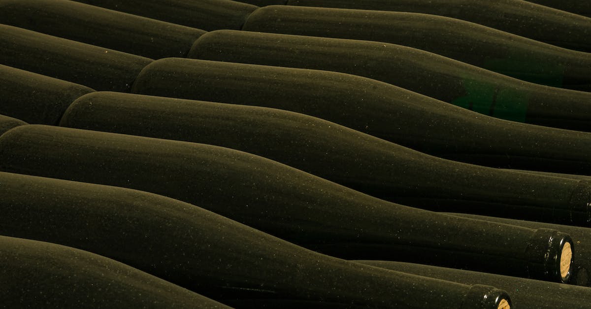 In Clash of clans, What happens if storage is full and you have extra loot from multiplayer battle? - From above of glass bottles placed side by side in rows in winery cellar In Clash of clans, What happens if storage is full and you have extra loot from multiplayer battle? - From above of glass bottles placed side by side in rows in winery cellar