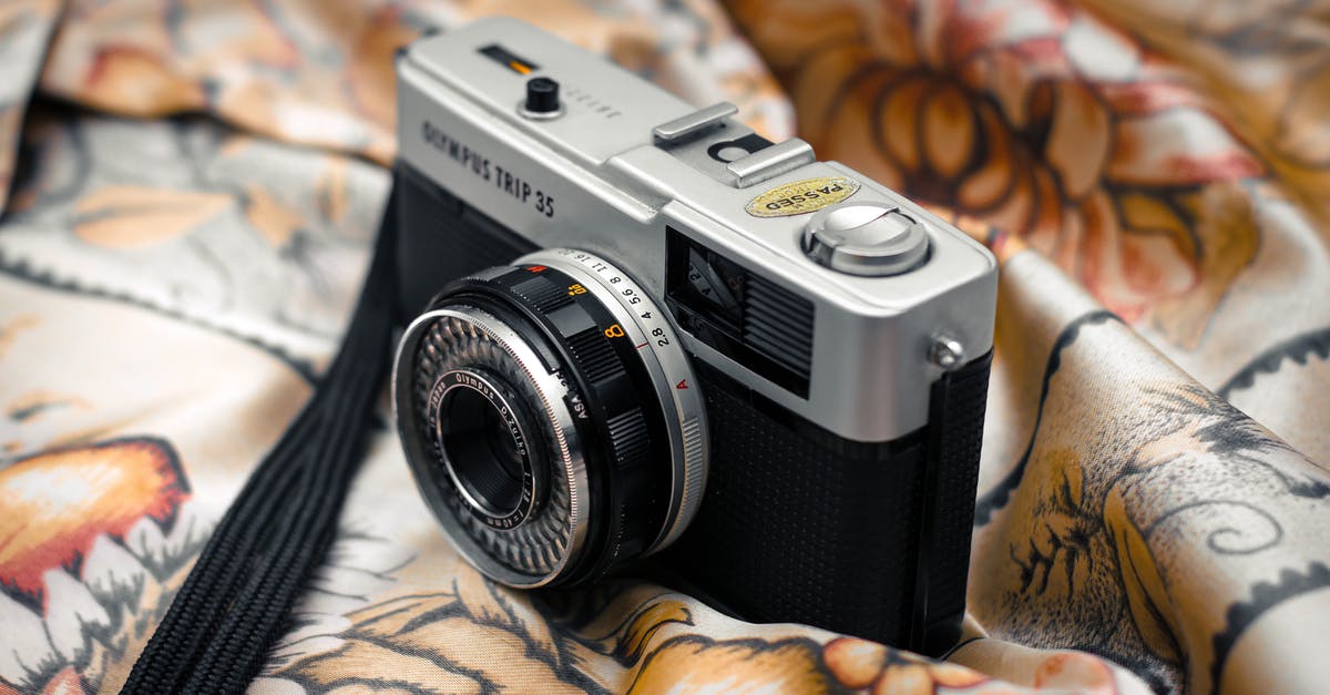 In Metal Gear Solid V: The Phantom Pain, where is the photo camera? - Closeup of shiny vintage photo camera placed on smooth textile in retro flat In Metal Gear Solid V: The Phantom Pain, where is the photo camera? - Closeup of shiny vintage photo camera placed on smooth textile in retro flat