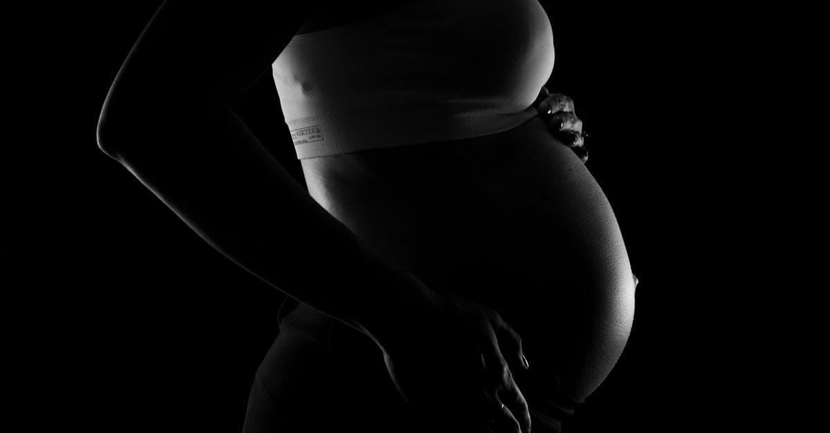 In Terranigma since Dark Gaia can make itself a body why does he need Ark? - Gray scale Photo of a Pregnant Woman 
