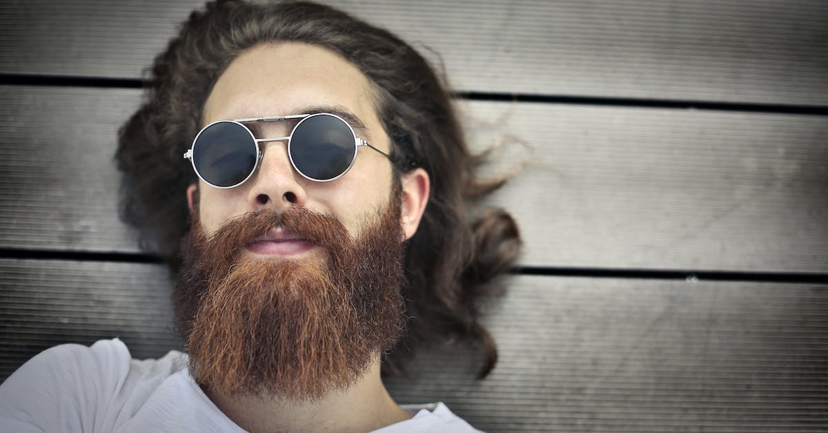 In TF2 do strange parts move the other strange parts down on your weapon? - Man in White Shirt Wearing Silver Framed Sunglasses