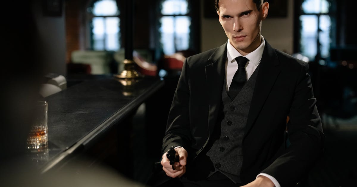 in the assault on dragons keep dlc in borderlands 2, does the handsom wizard drop the impaler? - Photo of Man Holidng a Handgun