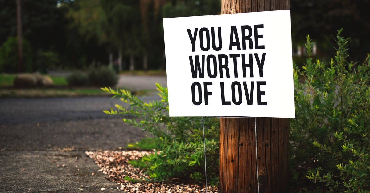 Increasable and decreasable signal strengths - You Are Worthy of Love Signage on Brown Wooden Post Taken