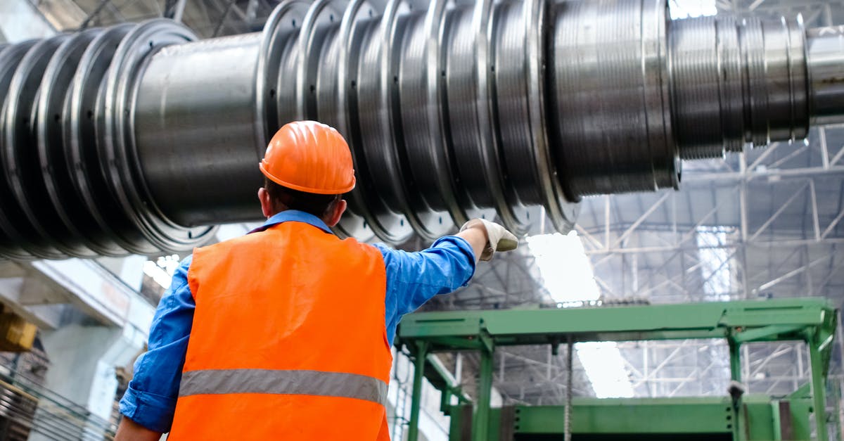 Industry production efficiency (or How to work out how much steel from iron ore?) - Man Wearing Orange Hard Hat