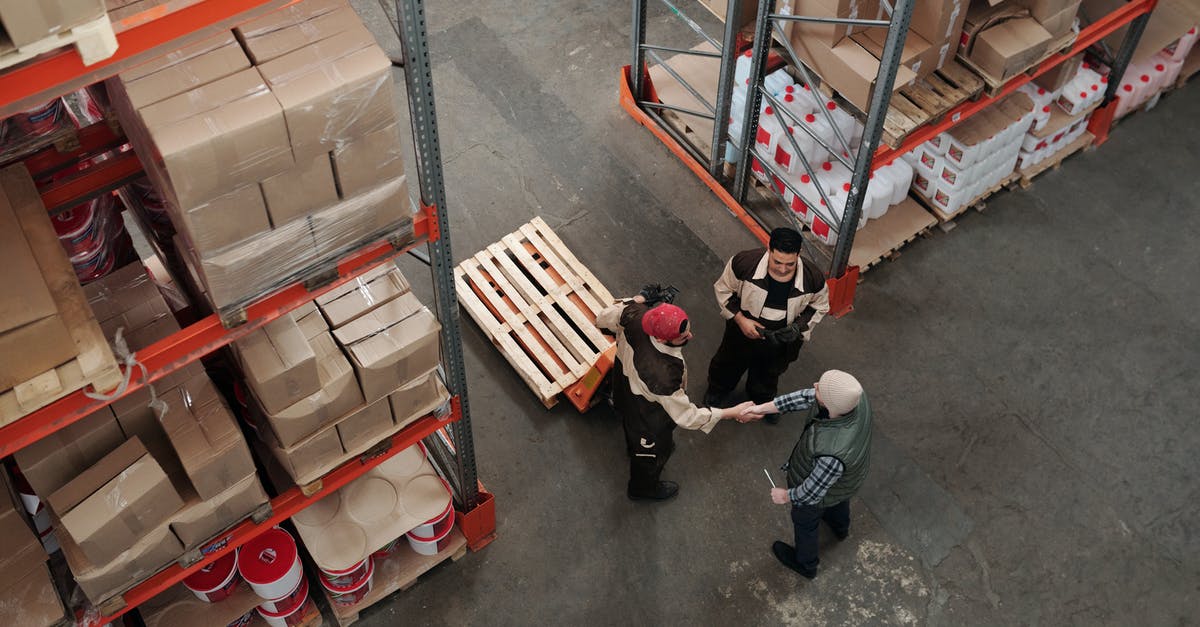 Ingress Inventory accounts. - Men Working in a Warehouse Ingress Inventory accounts. - Men Working in a Warehouse