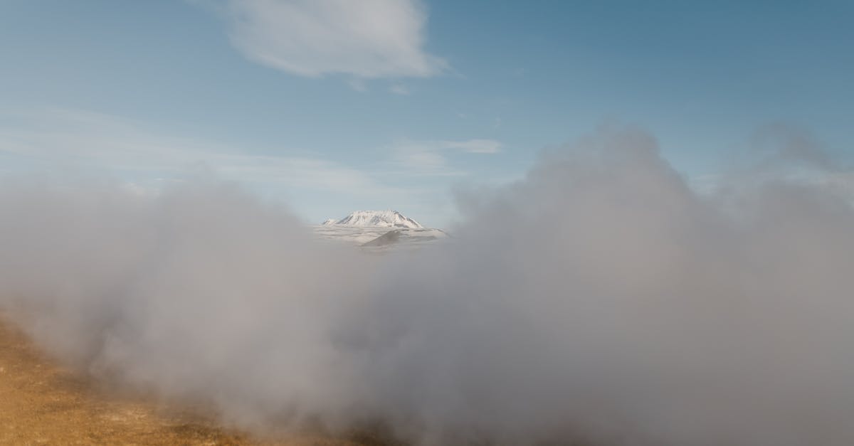 Installed GTA 5 Steam version greyed out, Discovering Existing Files, then completely redownloads game? - Scenery of dense gray clouds covering spacious mountainous valley against clear blue sky