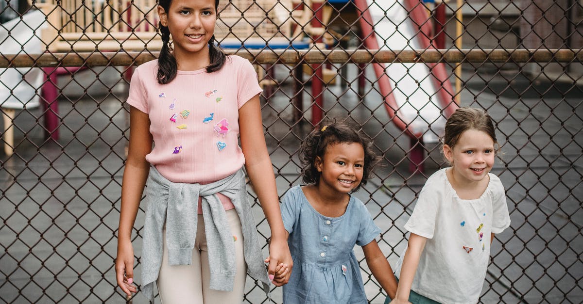 Iron golems attacking mobs - Girl in Pink Shirt Standing Beside Girl in White Shirt Iron golems attacking mobs - Girl in Pink Shirt Standing Beside Girl in White Shirt