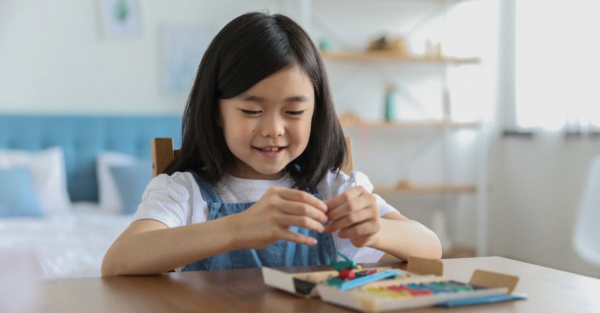 Is 1st generation GBA bright enough for indoor use? - Cute happy Asian girl sculpting from plasticine
