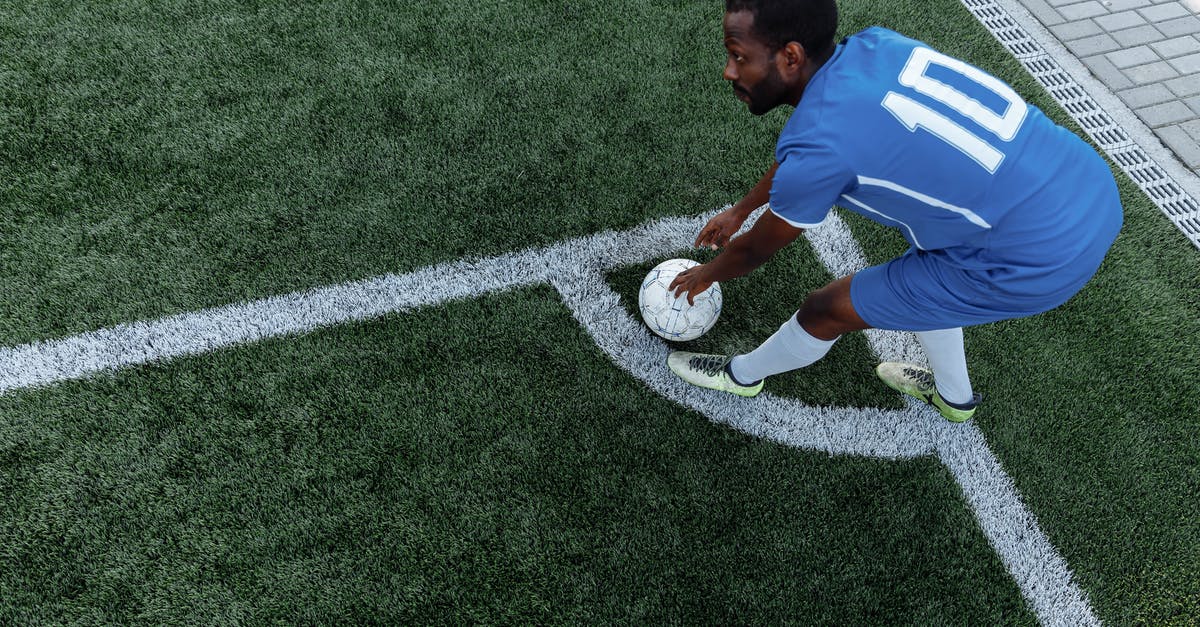 Is a 9 or 10 cost minion hit by Freezing Trap unplayable? - Man in Blue and White Soccer Jersey Shirt Playing Soccer on Green Grass Field