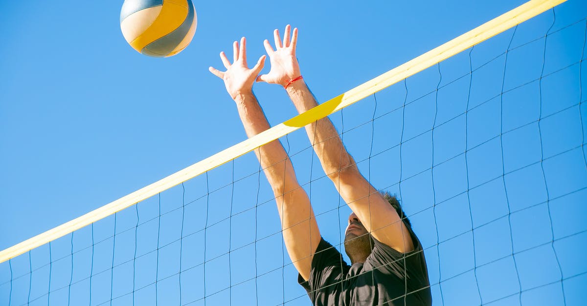 Is blocking the ultimate strategy? - Man Blocking a Ball Over the Net