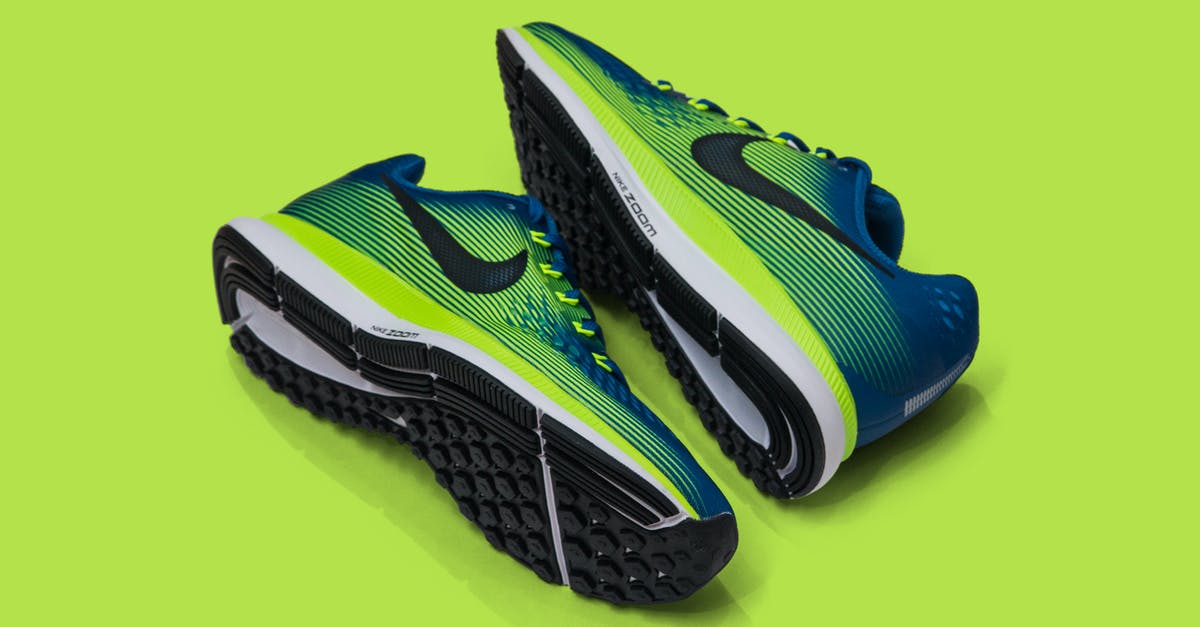 Is competitive Fortnite cross-platform? - From above of colored sneakers with blue and green surface and green and white and black sole for comfortable moving around streets against green background Is competitive Fortnite cross-platform? - From above of colored sneakers with blue and green surface and green and white and black sole for comfortable moving around streets against green background