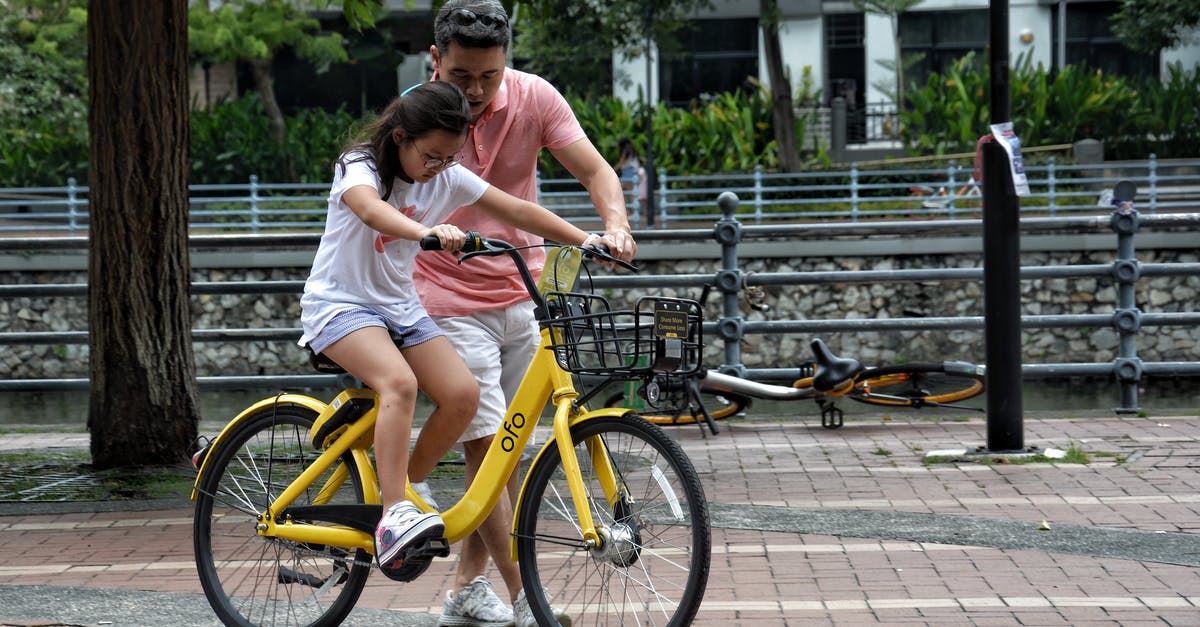 Is Emily Kaldwin really Corvo's daughter? - Photography of Girl Riding Bike Beside Man