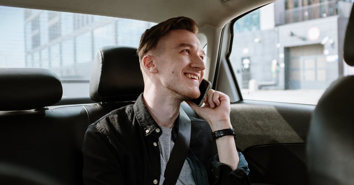 Is it considered cheating if one plays Pokémon GO while being a passenger in someone’s car? - Man in Black Jacket Sitting Inside Car Is it considered cheating if one plays Pokémon GO while being a passenger in someone’s car? - Man in Black Jacket Sitting Inside Car