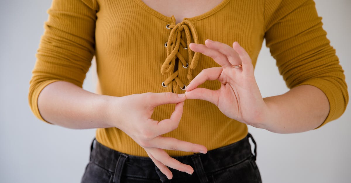 Is it fine to remove all the language files for localizations I don't need in The Witcher 2? - Woman Communicating by Finger Language