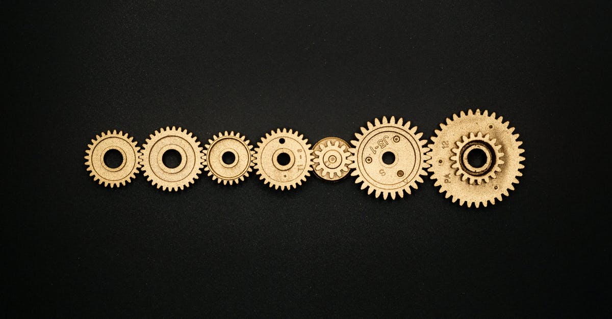 Is it impossible to be a certain rank, say, Gold 3, without having won or drawn against an opposing team where at least 1 player was at least Gold 2? - Photo of Golden Cogwheel on Black Background