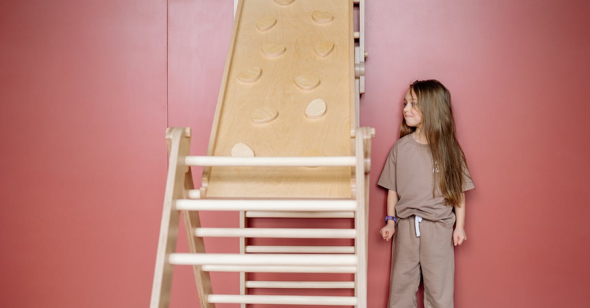 Is it just me, or is this trick-ramp broken? - Girl Standing Beside a Reversible Rockwall/Slide Ramp 