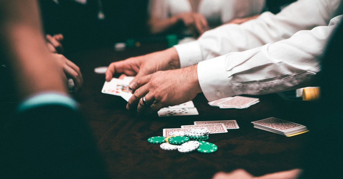 Is it more cost effective to gamble frequently with few chips, or infrequently with many chips? - People Playing Poker