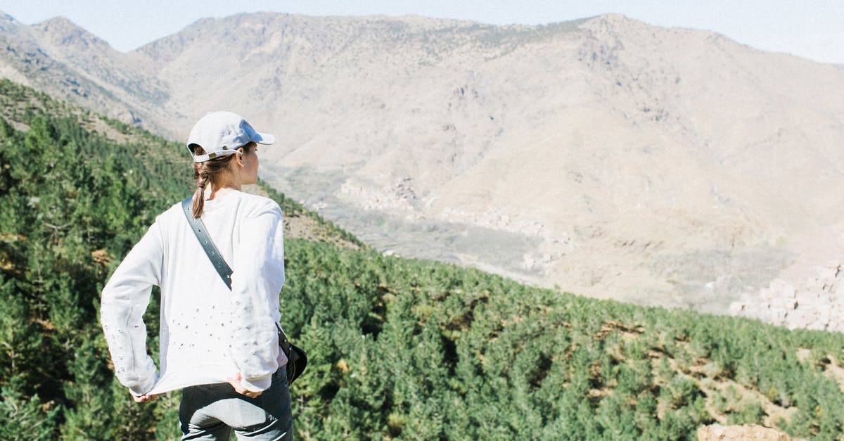 Is it natural that cops attack another cop? - Female traveler on high hillside in mountains Is it natural that cops attack another cop? - Female traveler on high hillside in mountains