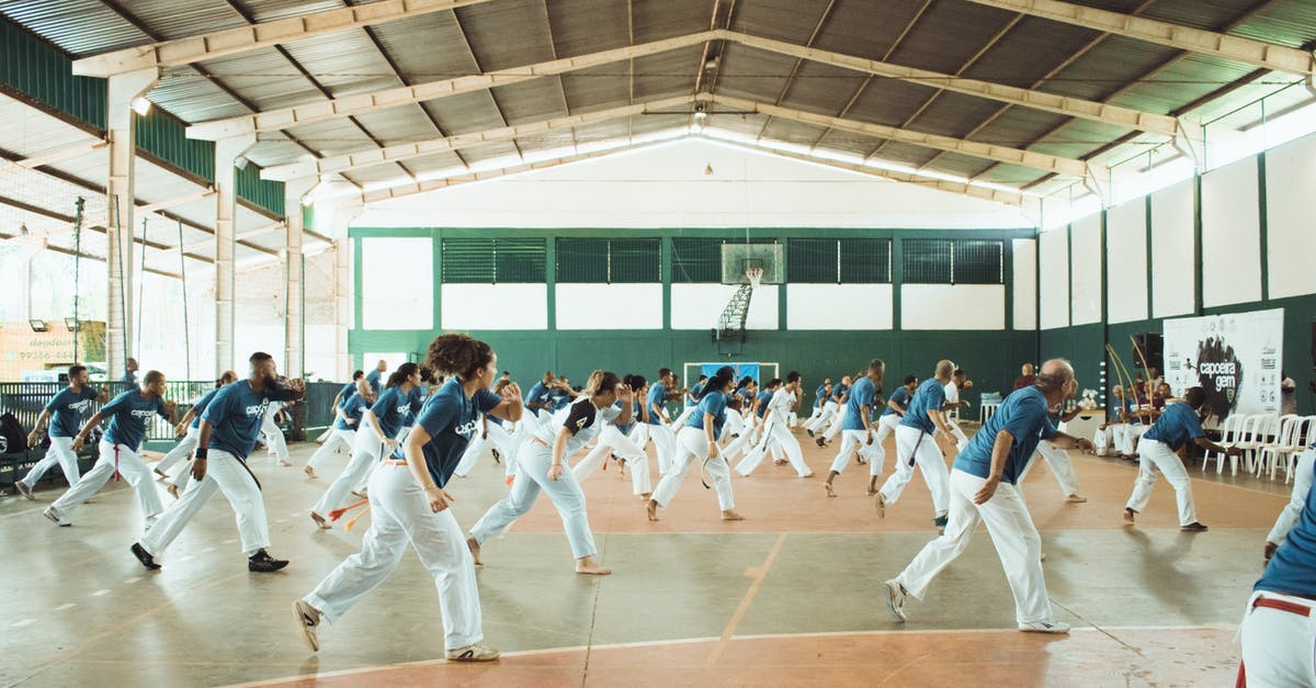 Is it possible to activate a squad-bonus enchanced ammo type without overriding squad members' settings? - People Dancing in Gym