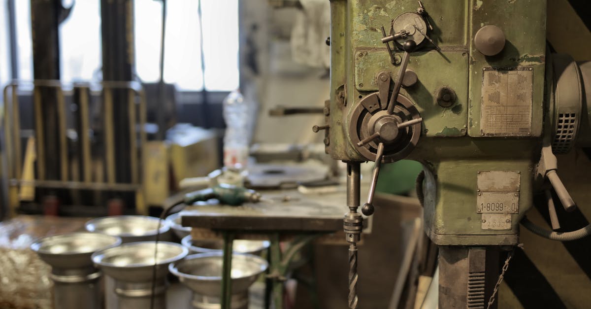 Is it possible to automate the crafting or repair of Tinkers' Construct tools? - Side view of industrial drilling machine with green casing situated in deserted workshop Is it possible to automate the crafting or repair of Tinkers' Construct tools? - Side view of industrial drilling machine with green casing situated in deserted workshop