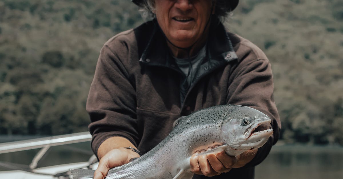 Is it possible to catch Mewtwo more than once? - Man in Black Jacket Holding Fish